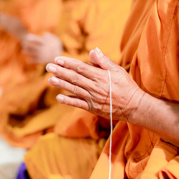buddhist monks blessing rope bracelet